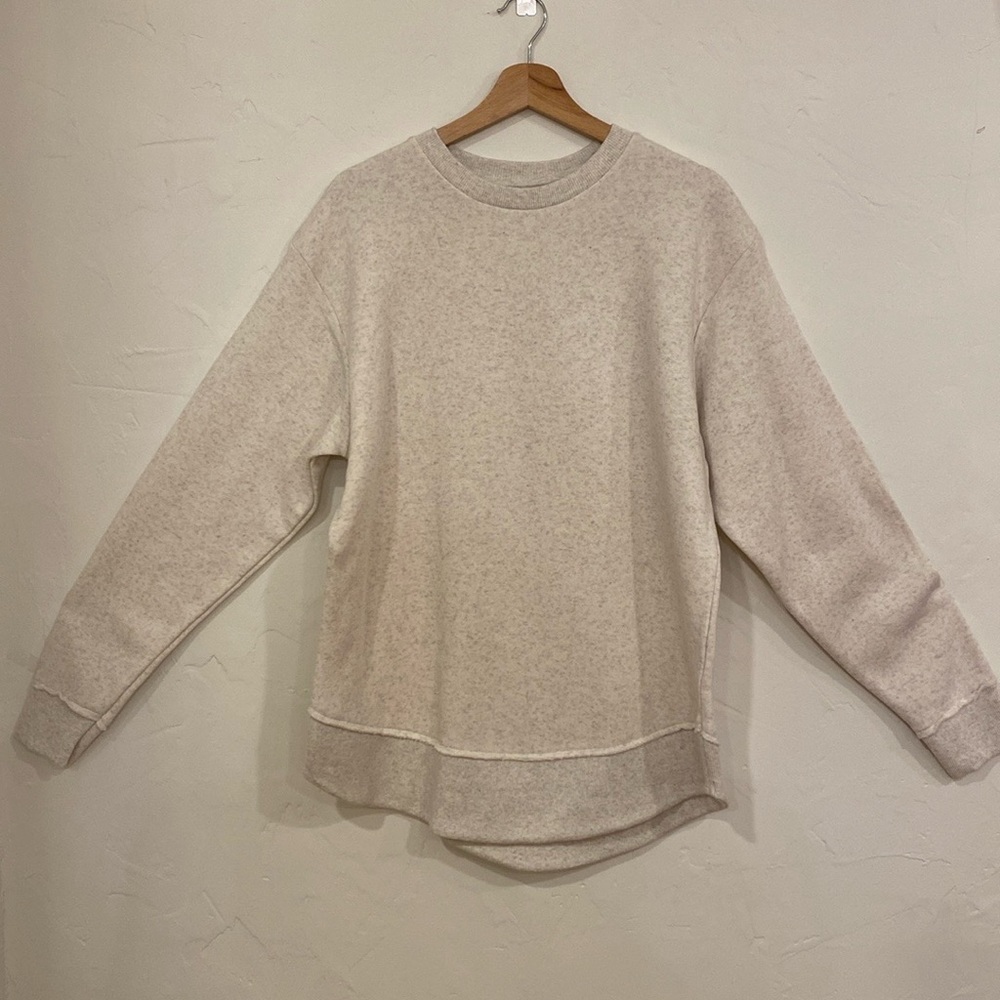 L.A.T  crewneck, curved hem cream sweatshirt. Longer length. New